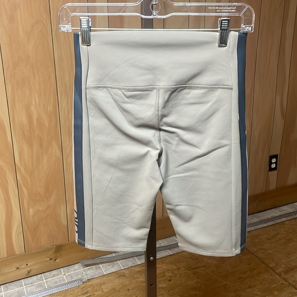 ALO Yoga Tan Athletic Shorts with Orange Accents - Picture 2 of 3